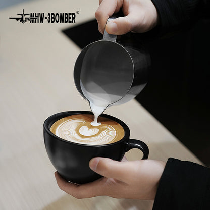 MHW-3BOMBER P5184 GT milk pitcher — 600 ml matte black, overhead latte pour. Cups, machines and scene items are not included.