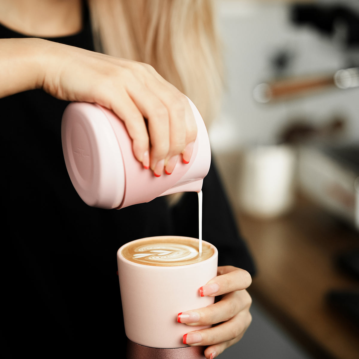 P6514P pink GT handleless 400 ml milk pitcher — barista pouring view. Cups and other scene items are not included.