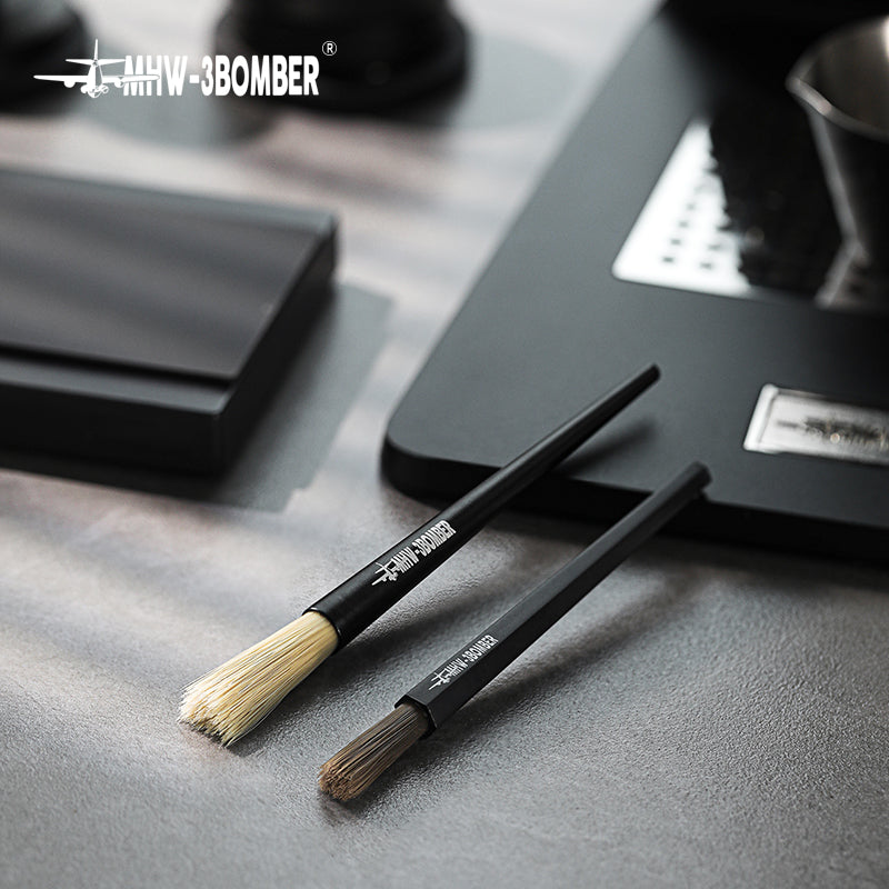 MHW-3BOMBER B5525B dark-bristle ABS brush beside the lighter-bristle B5337B aluminium comparison brush; only the B5525B SKU is offered