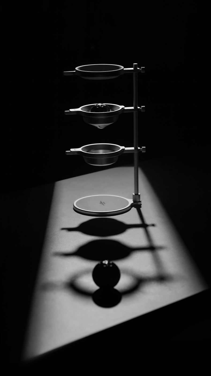 MHW-3BOMBER BCH6640B Obsidian Black Smooth pour-over stand in a studio light-and-shadow view