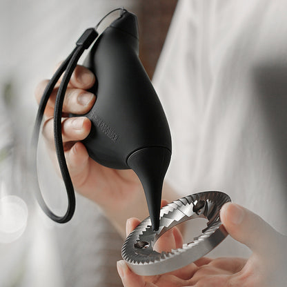 MHW-3BOMBER AB6721B black Bird Air Blower nozzle and strap shown with a grinder burr; burr not included