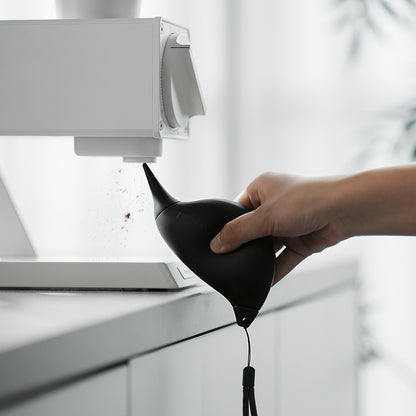MHW-3BOMBER AB6721B black Bird Air Blower in a coffee-tool cleaning scene; equipment not included