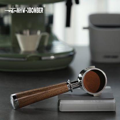 BP6083L walnut bottomless portafilter resting on a preparation scale; scale and other scene equipment are not included and the photo is not net-weight evidence.