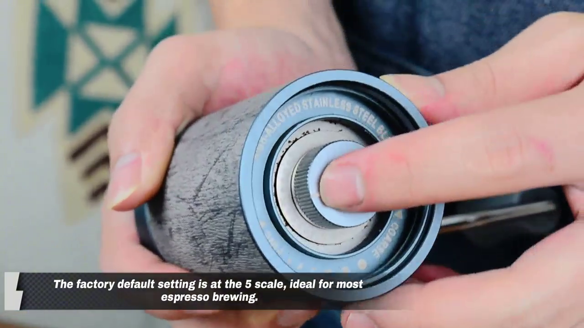 Underside grind adjustment on the CERA+ CG01 Space Grey manual coffee grinder