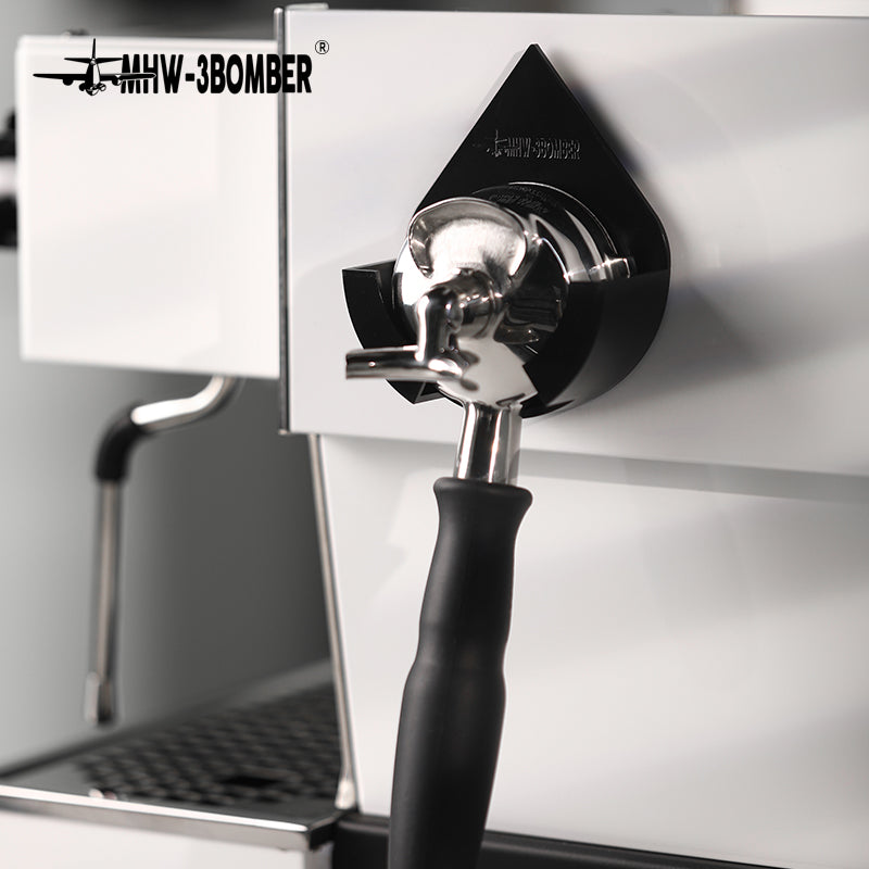 DPH5713B Black droplet holder supporting a spouted portafilter on a machine panel; machine and portafilter not included