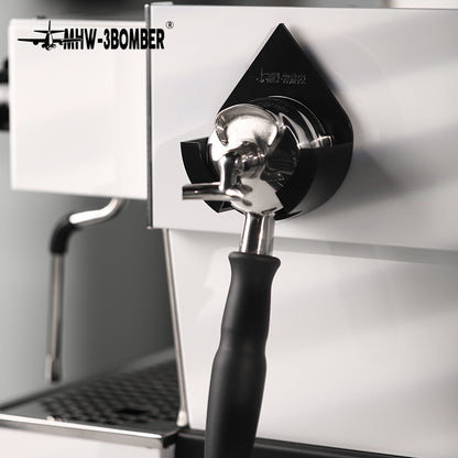 DPH5713B Black droplet holder supporting a spouted portafilter on a machine panel; machine and portafilter not included