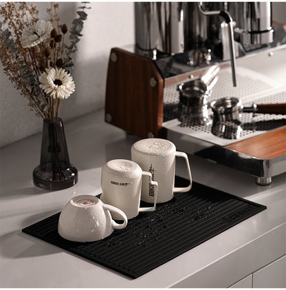 MHW-3BOMBER black drying pad below mugs; mugs not included