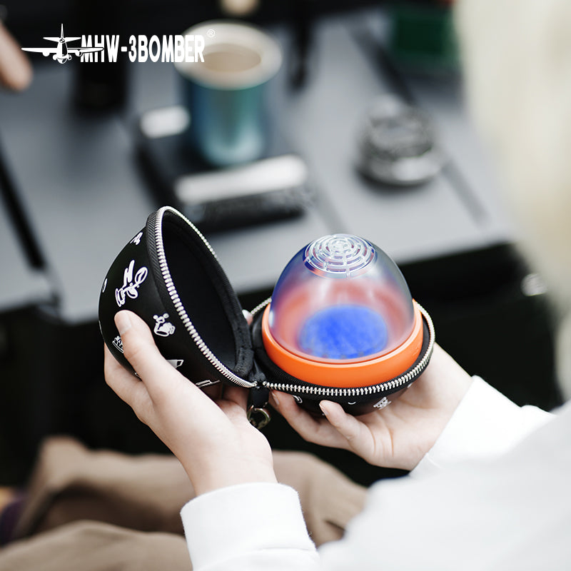 MHW-3BOMBER blue Eggonaut dripper inside its depicted carry pouch