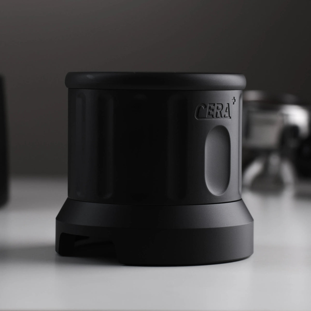CERA+ ET58 black rear housing and brand detail on a countertop