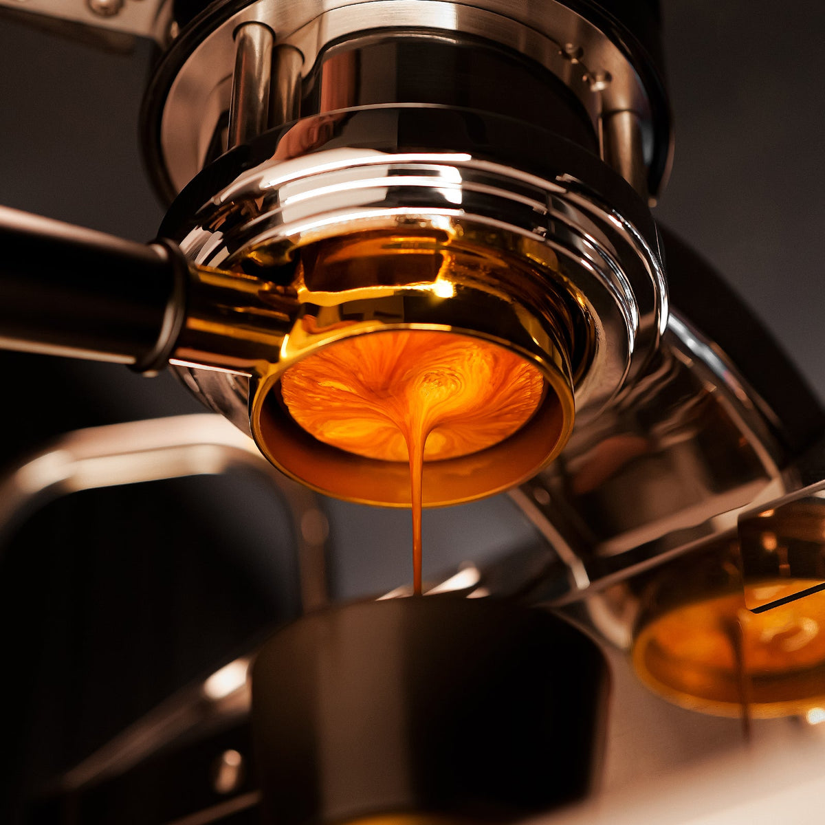 MHW-3BOMBER FB5635 silver JusBean 18 g filter basket during espresso extraction; portafilter and machine are scene props