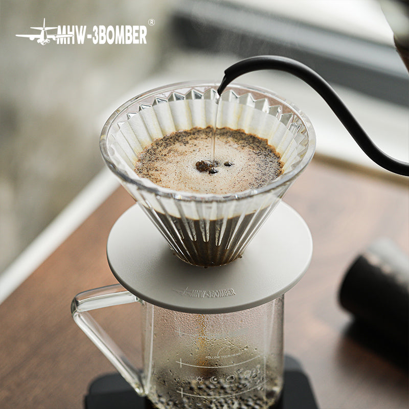 MHW-3BOMBER FC5875W Elf Glass Dripper — close view of pouring into the clear white-base dripper