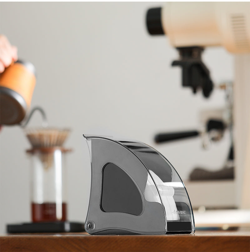 MHW-3BOMBER FH5970B black Snail holder with its cover closed on a coffee worktop; machines, dripper and coffee not included