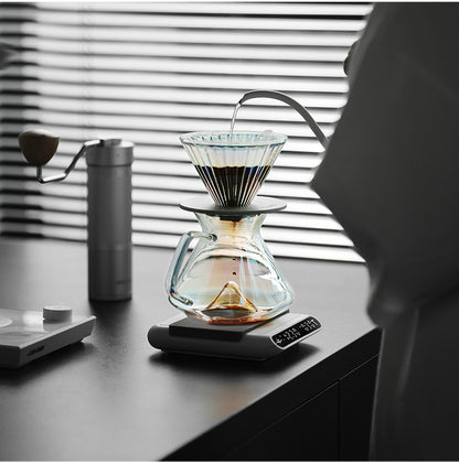 MHW-3BOMBER clear Hill coffee server brewing on a scale in window light
