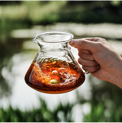 MHW-3BOMBER clear Hill coffee server held with coffee inside