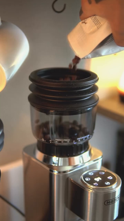 HiBREW G7 Silver grinder hopper being filled with coffee beans