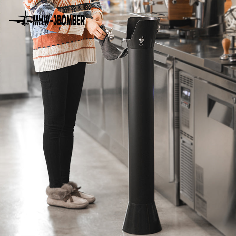 Full GB5449 standing bin beside an espresso counter during portafilter wiping