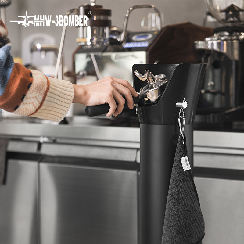 Spouted portafilter over the GB5449 bin at an espresso workstation