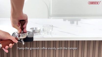 HiBREW H13 Silver — tamping coffee in the handled portafilter