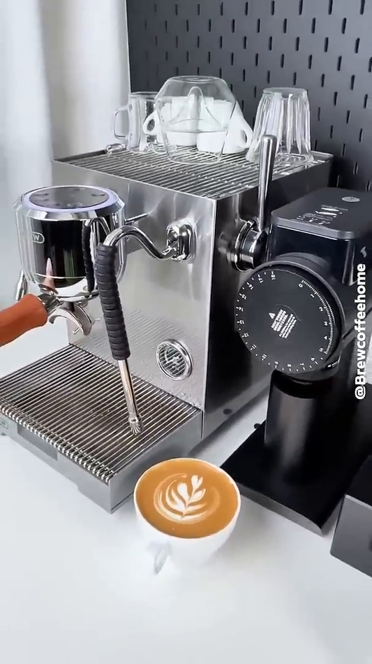 HiBREW H21 silver espresso machine on a coffee counter