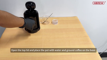 HiBREW H9 — placing the coffee pot under the open lid