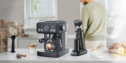 HiBREW H10A black espresso machine on a coffee counter; grinder not included