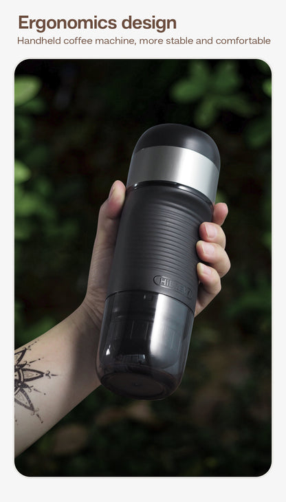HiBREW H4A — Black brewer held outdoors showing the rear grip
