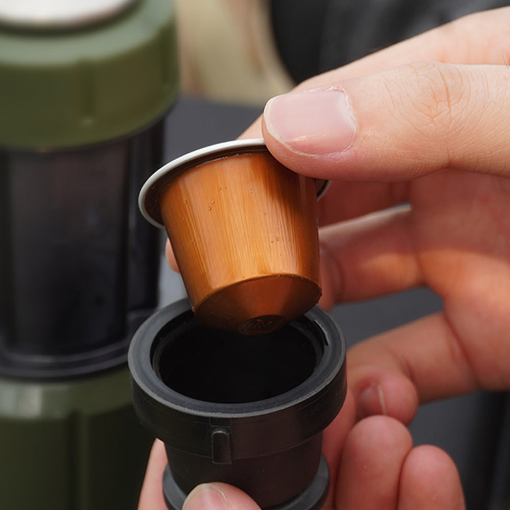 An NS-compatible capsule being placed in the HiBREW H4D adapter