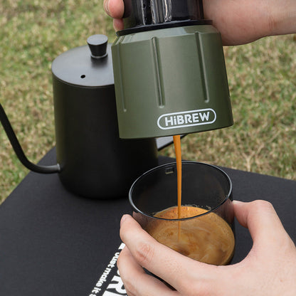 Coffee being poured from the Green HiBREW H4D into a cup