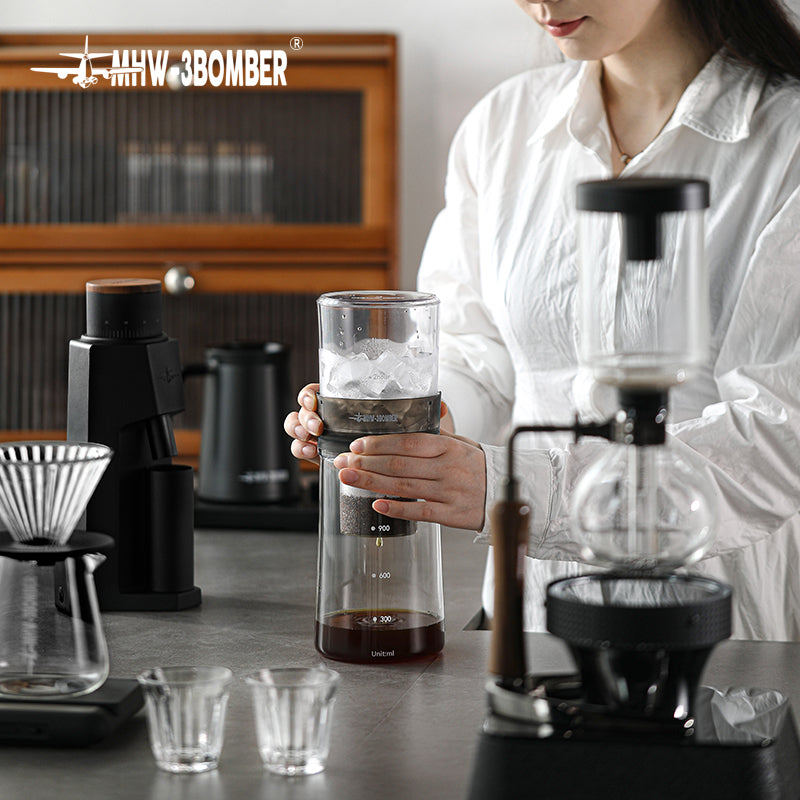 MHW-3BOMBER ID5900 complete stacked brewer held in a coffee-workspace scene; other equipment and scene props are not included