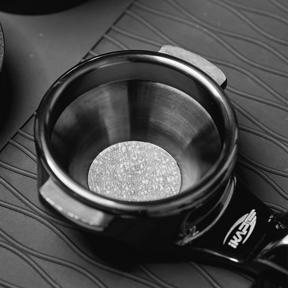 32 mm paper filter placed at the base of an IKAPE convex espresso basket