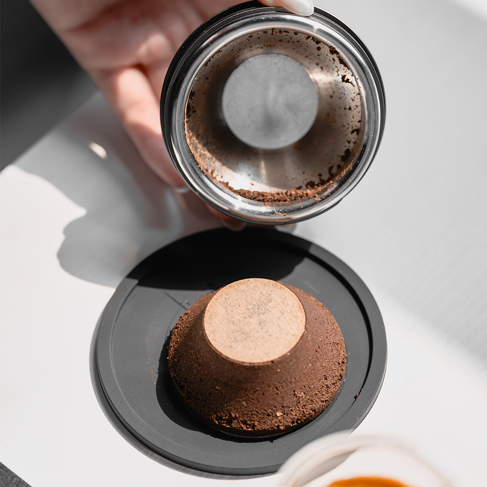 Used 32 mm paper filter inside the basket above an extracted coffee puck