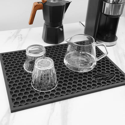 IKAPE black honeycomb drying mat with upside-down glasses and a server; all drinkware and equipment are props, mat only
