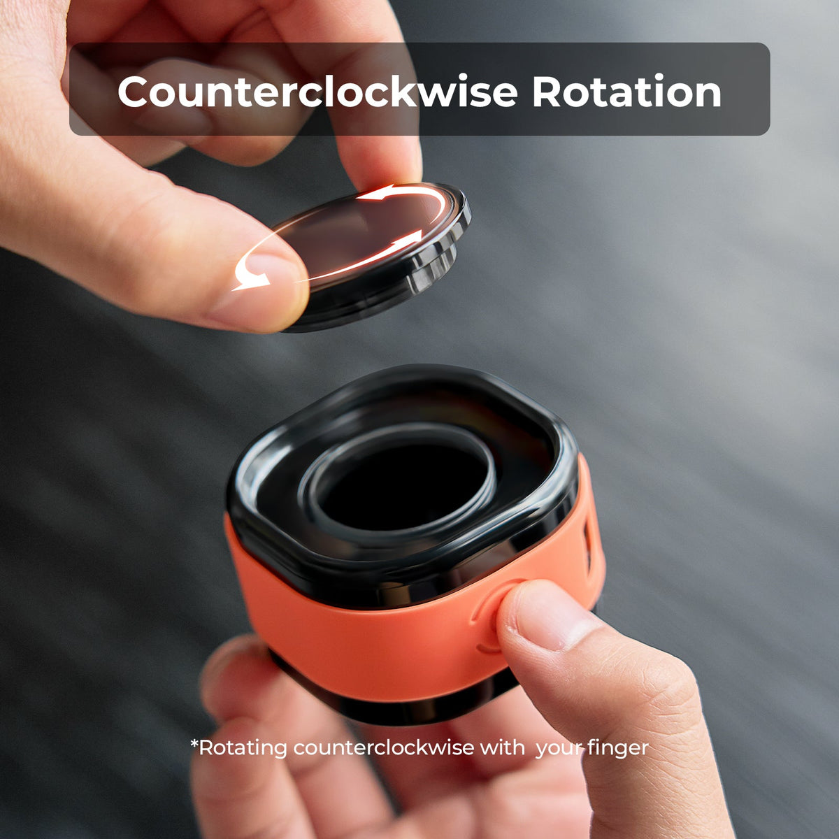 IKAPE electric coffee bean atomizer, black and orange, water reservoir with lid removed