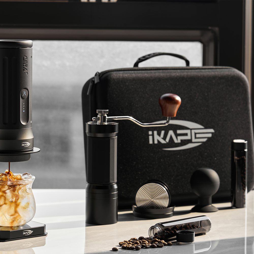 IKAPE carrying bag on a windowsill beside coffee accessories