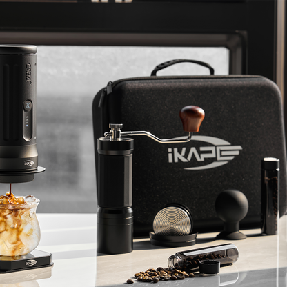 IKAPE carrying bag on a windowsill beside coffee accessories