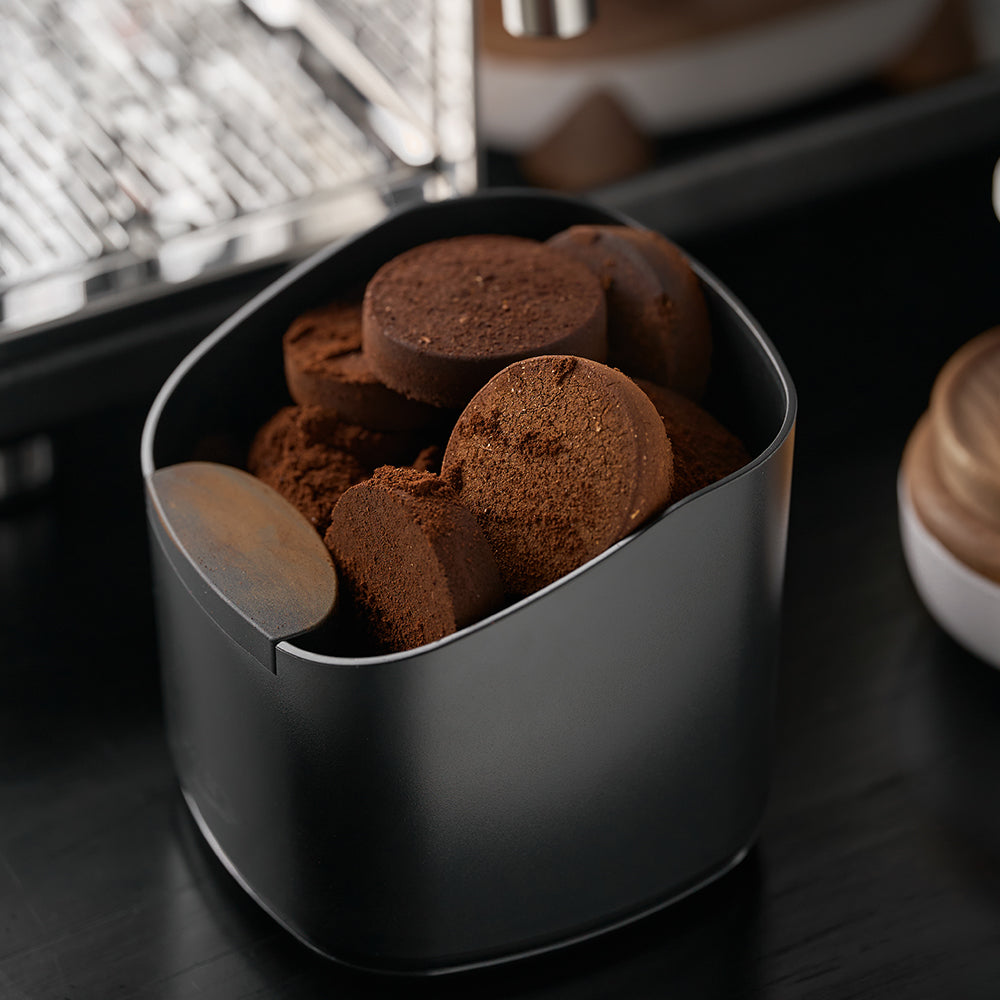 IKAPE V2 black knock box holding used coffee pucks