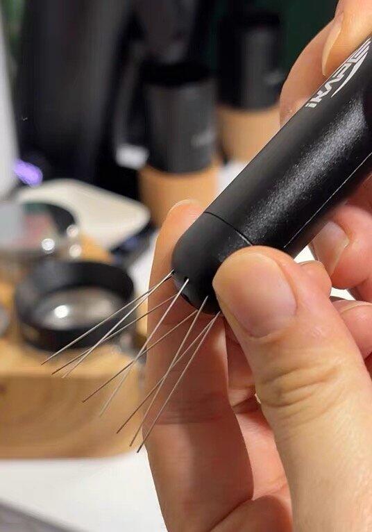 IKAPE black retractable WDT tool showing its extended needle arrangement