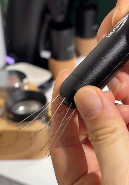 IKAPE black retractable WDT tool showing its extended needle arrangement