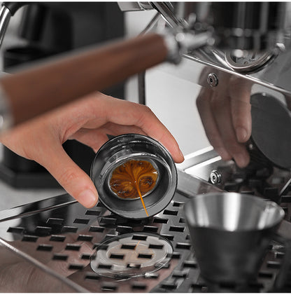 MHW-3BOMBER M5503 black mirror positioned near an espresso group head