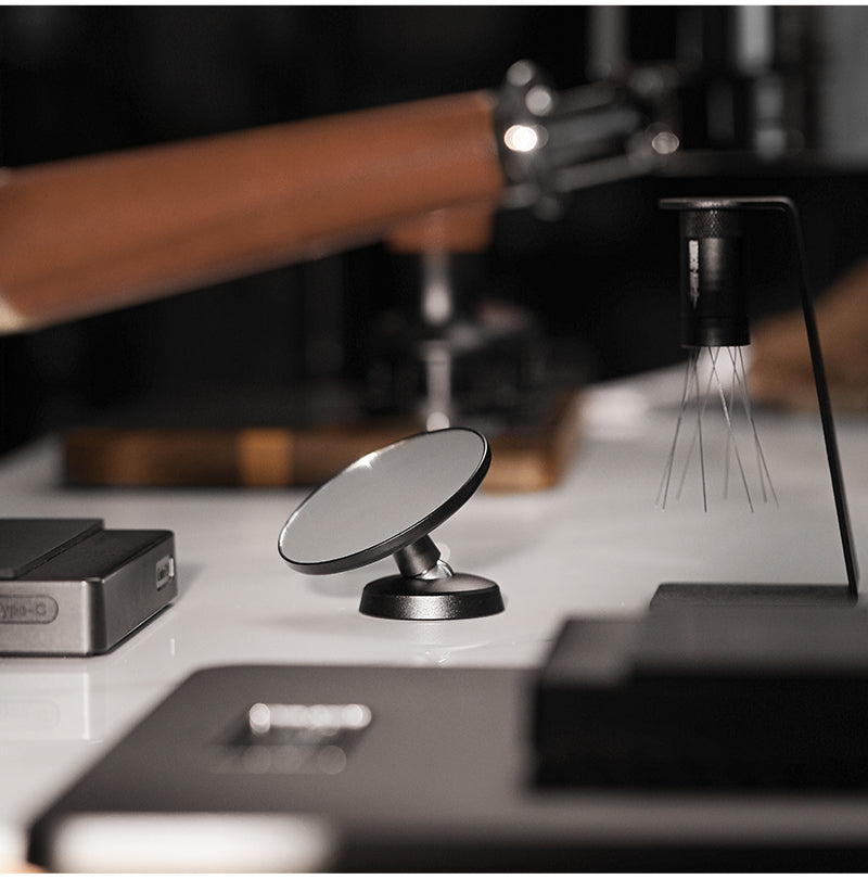 MHW-3BOMBER M5503 black mirror on a white coffee counter