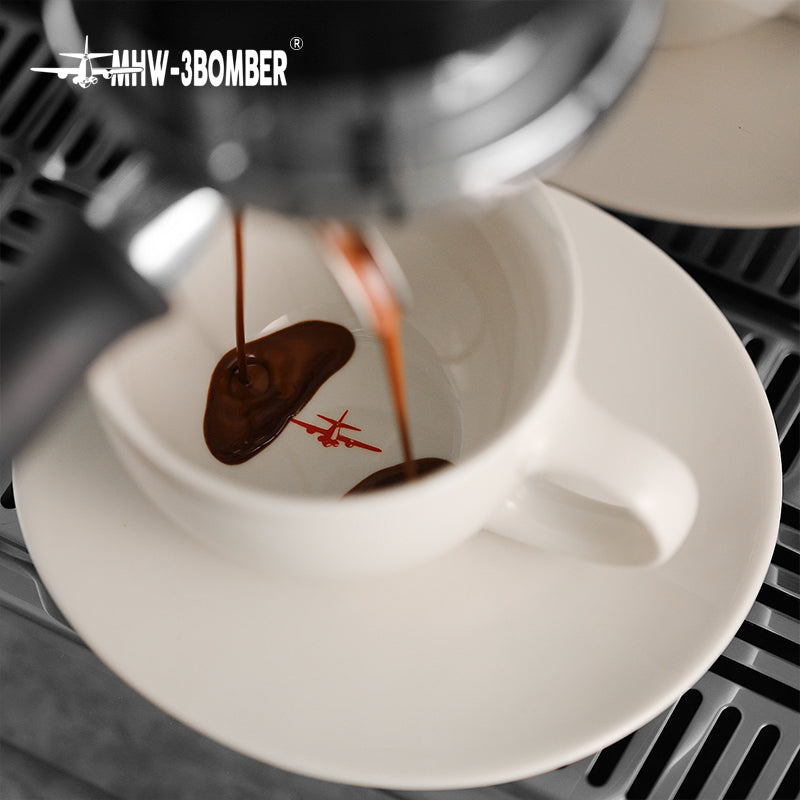 MHW-3BOMBER Mars Khaki white cup during espresso preparation