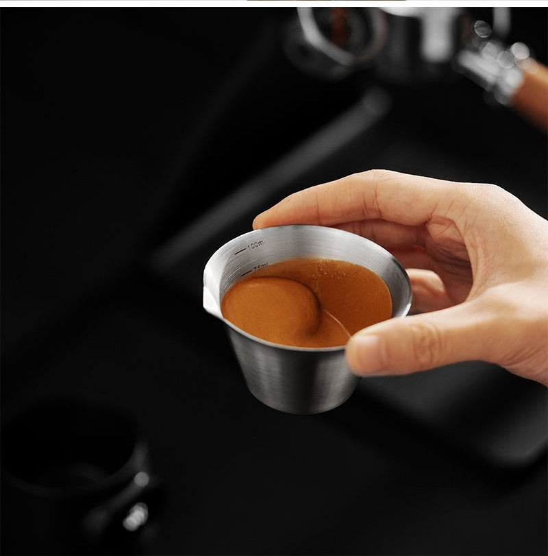 MHW-3BOMBER ES8031 black ESP coffee scale — cup lifted from the weighing base