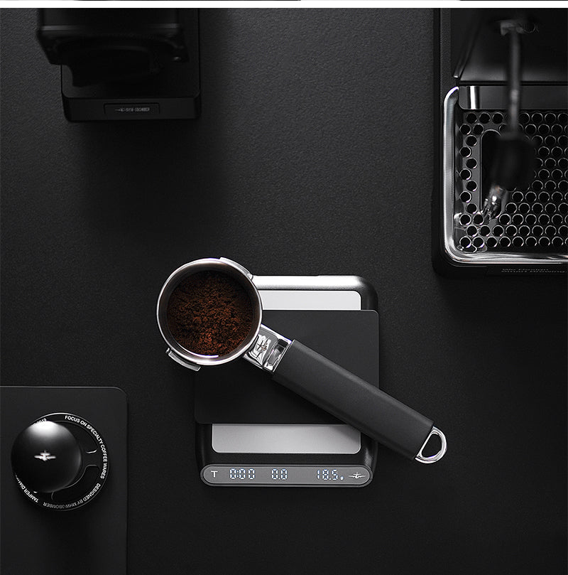 MHW-3BOMBER ES5486B black Formula coffee scale — overhead portafilter weighing scene