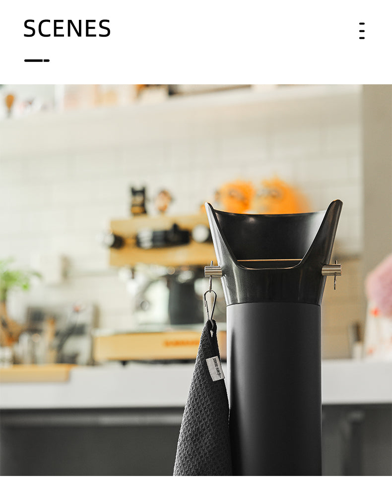 MHW-3BOMBER GB5449 black standing knock bin — upper bin at a coffee workstation