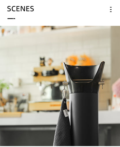 MHW-3BOMBER GB5449 black standing knock bin — upper bin at a coffee workstation