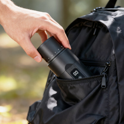 HiBREW G5mini grinder being placed in a travel bag