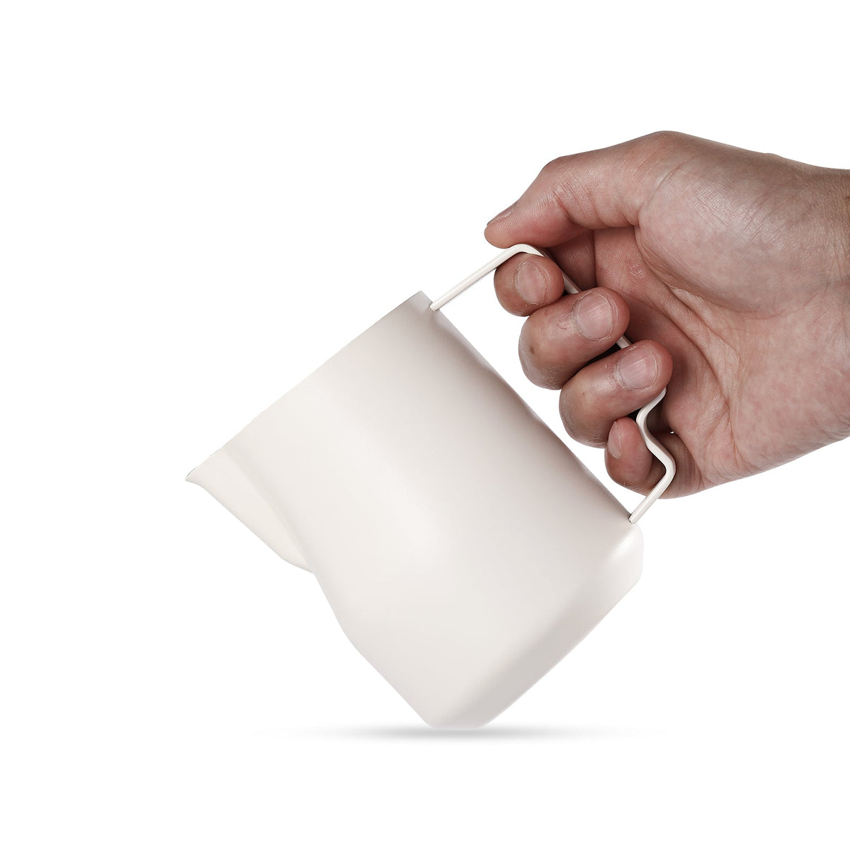 MHW-3BOMBER Turbo 450ml Off White milk pitcher, hand holding the shaped handle