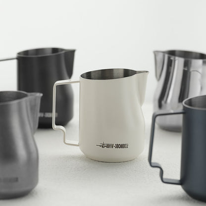 MHW-3BOMBER Turbo 450ml Off White milk pitcher, front view on a counter
