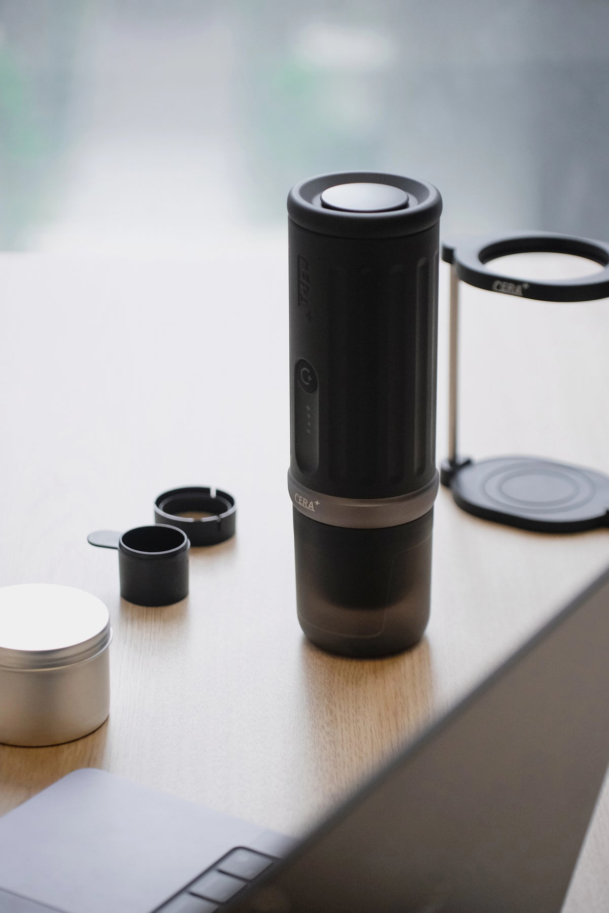 CERA+ PCM03S Space Grey with cup and coffee adapters on a table; stand sold separately