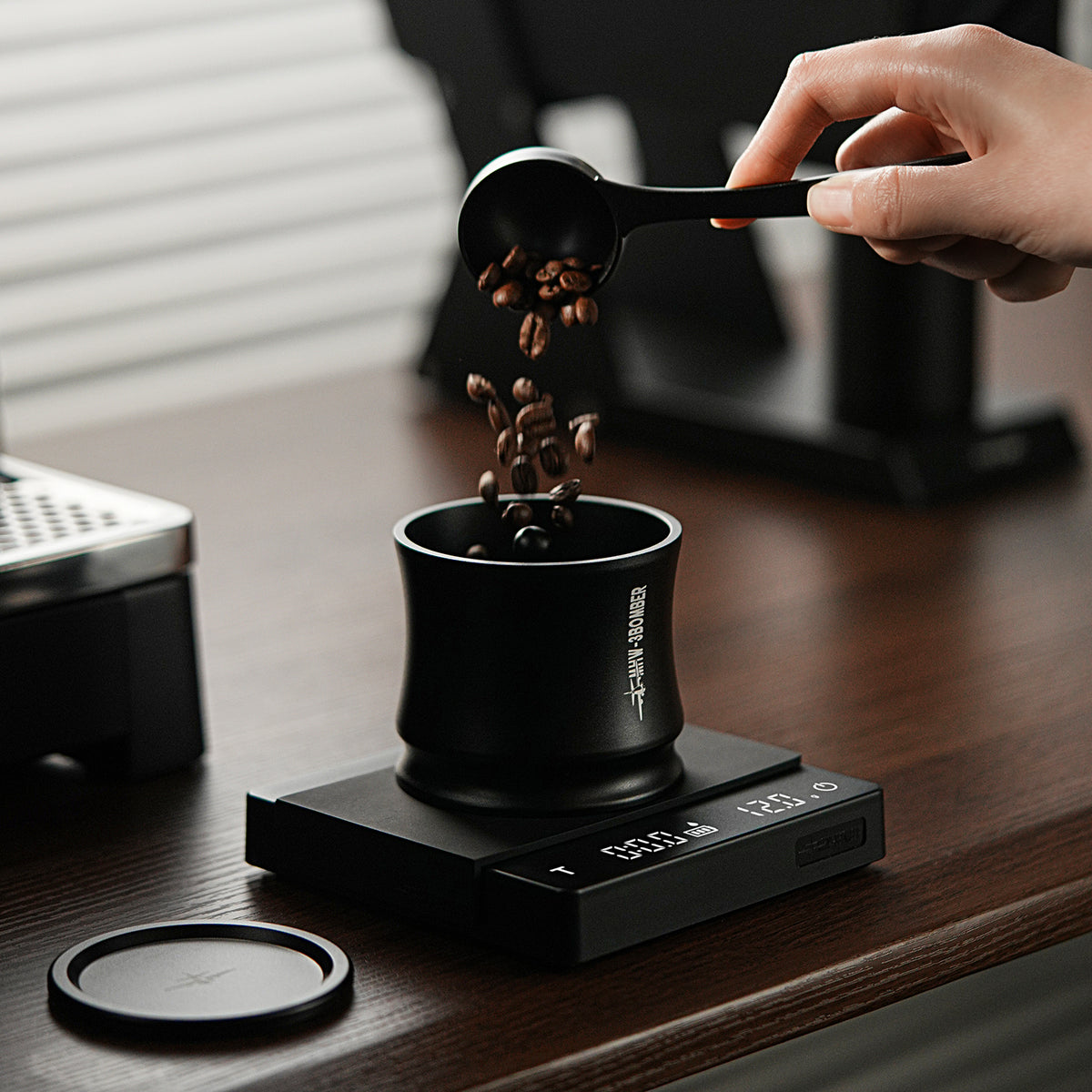 MHW-3BOMBER Radiance dosing tool being filled with coffee beans